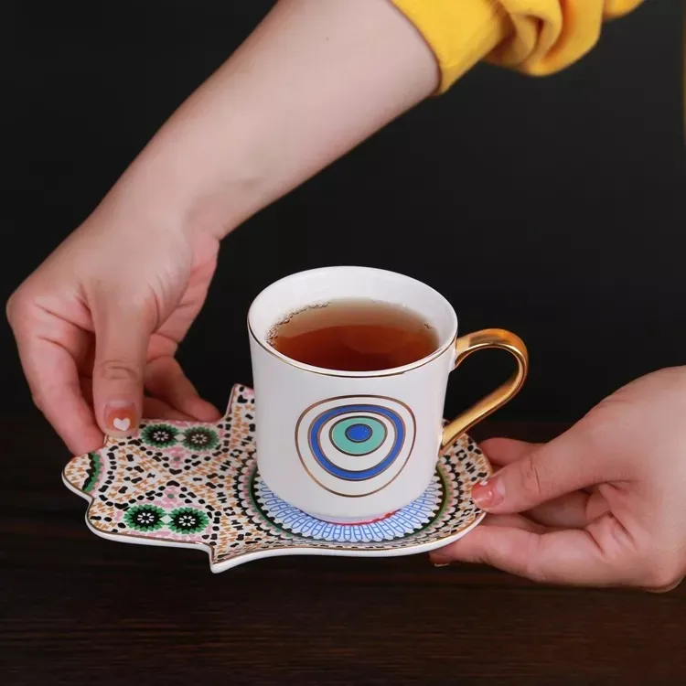 الرجعية معلقة الأذن الإبداعية  - مراجعة Espresso Cup Saucer وسعره